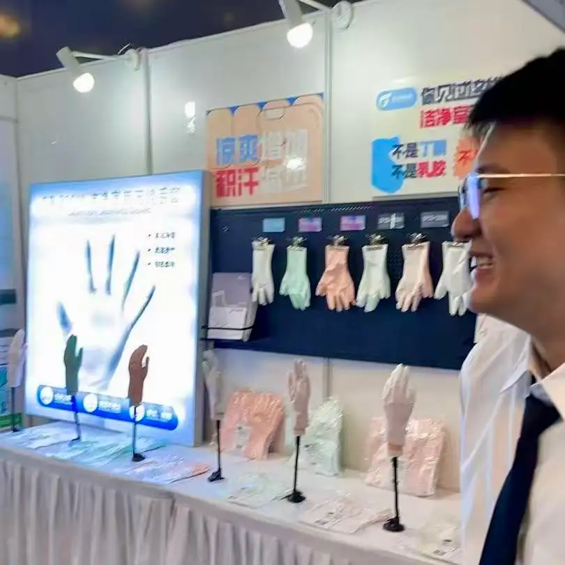 Cleanroom gloves booth talk with coustomers